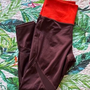 Maroon and orange Athleta leggings